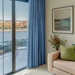 Függönyök - Sötétítő függöny Octavia (világoskék)