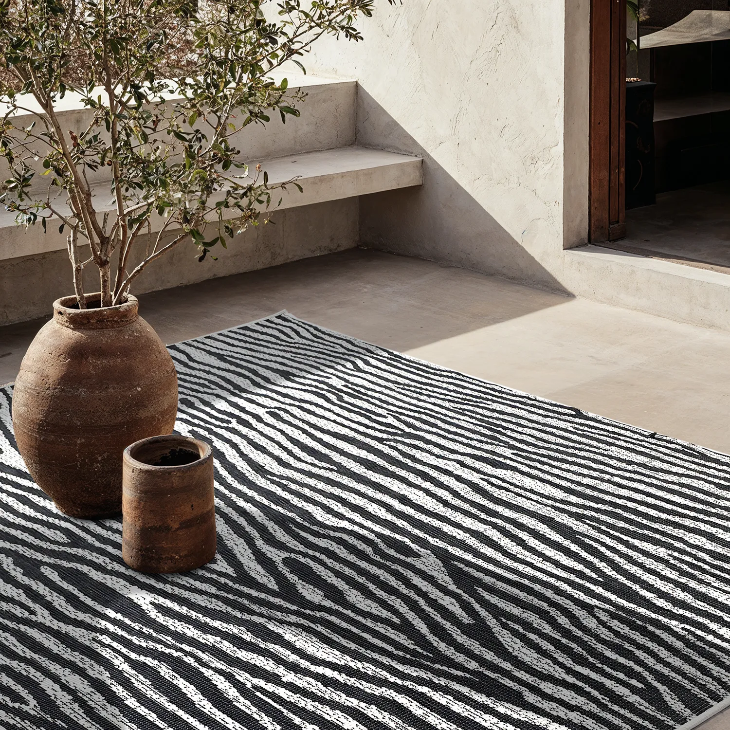 Beltéri és kültéri szőnyeg - utomhusmatta - Vaura (fekete/fehér)