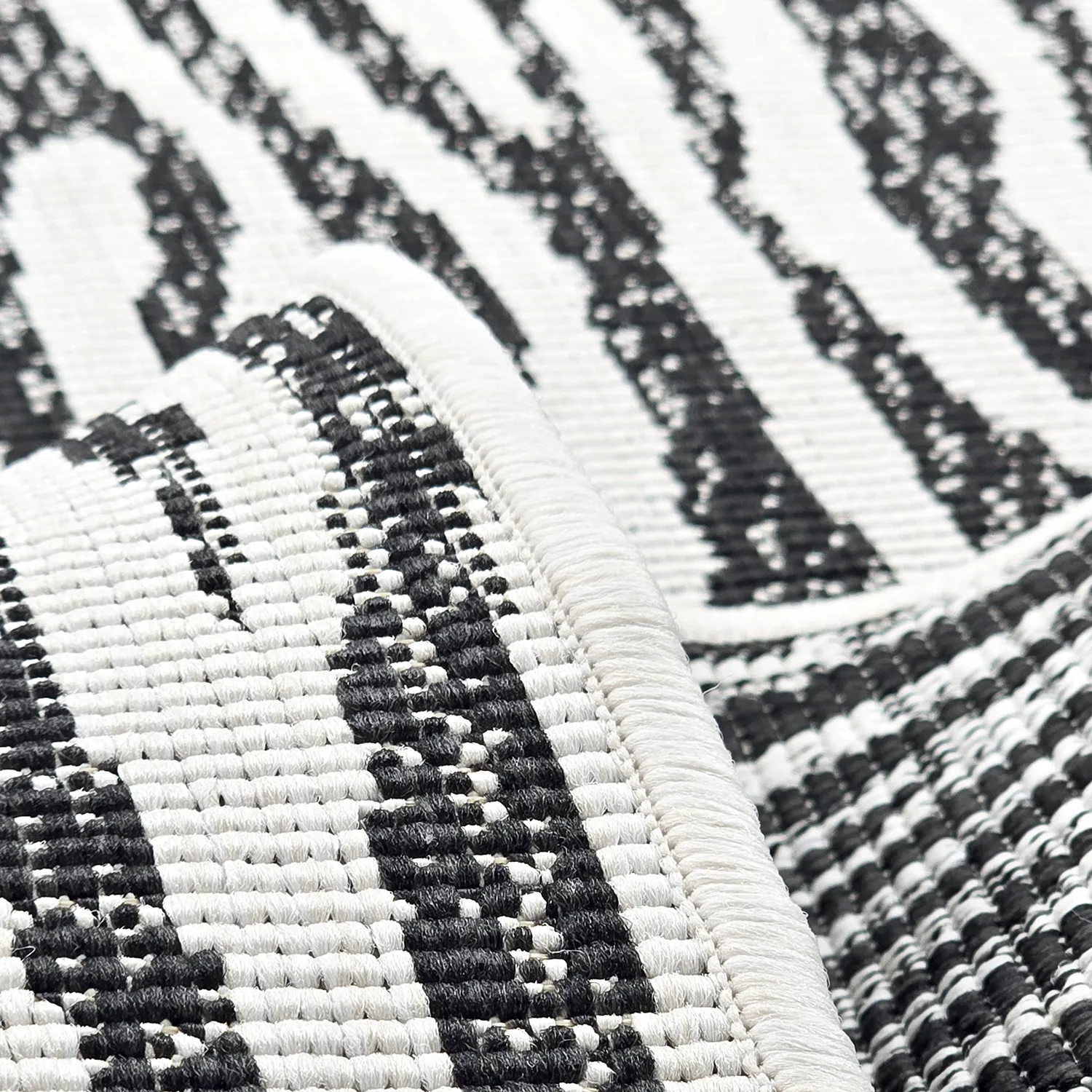 Beltéri és kültéri szőnyeg - utomhusmatta - Vaura (fekete/fehér)