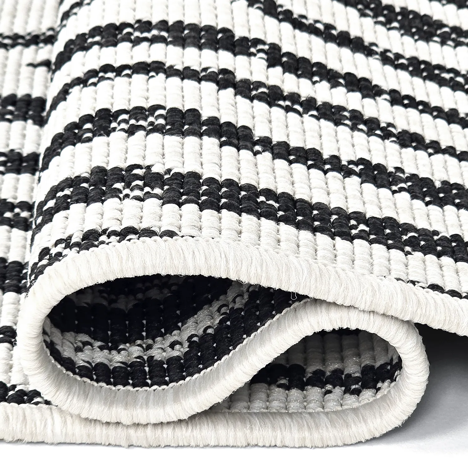 Beltéri és kültéri szőnyeg - utomhusmatta - Vaura (fekete/fehér)